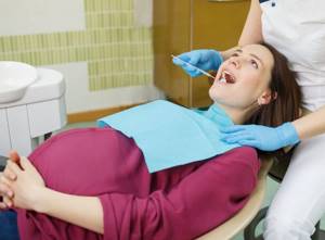 беременная у стоматолога