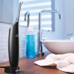 ирригатор — прибор, который удаляет налет с зубов и между ними струей воды с пульсацией