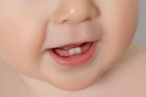 молочные зубы сроки