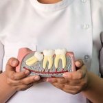 Сколько болит десна после удаления зуба мудрости