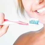 How many minutes should children brush their teeth?
